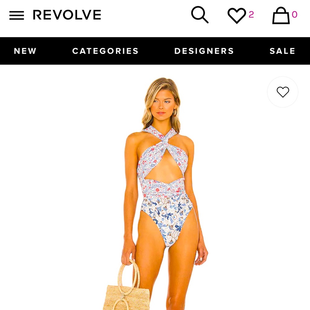Elegant Revolve One Piece. Never worn still in packaging.